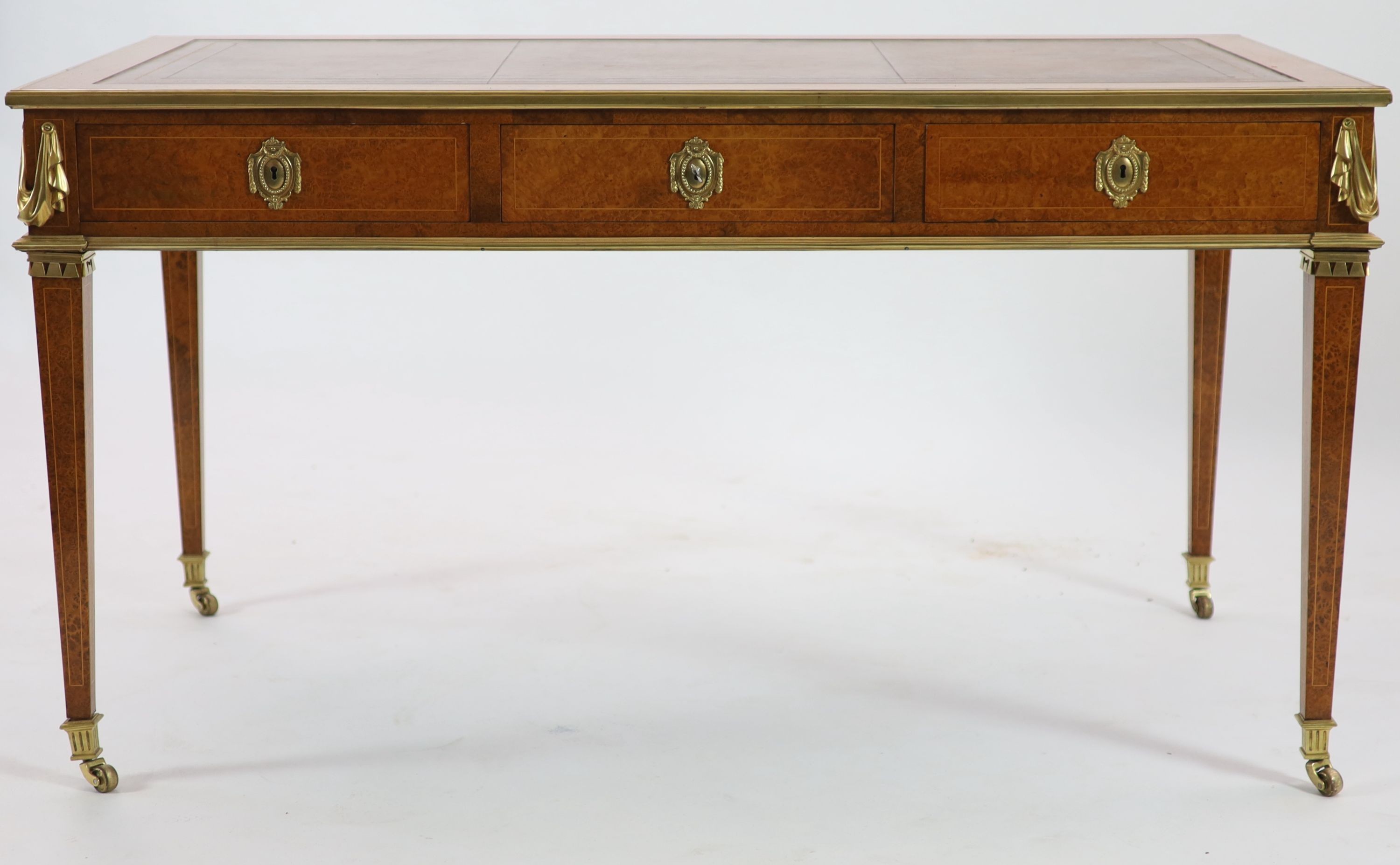 Laporte Barmen. A Louis XVI style ormolu mounted burr wood bureau plat, W.142cm D.76cm H.77cm